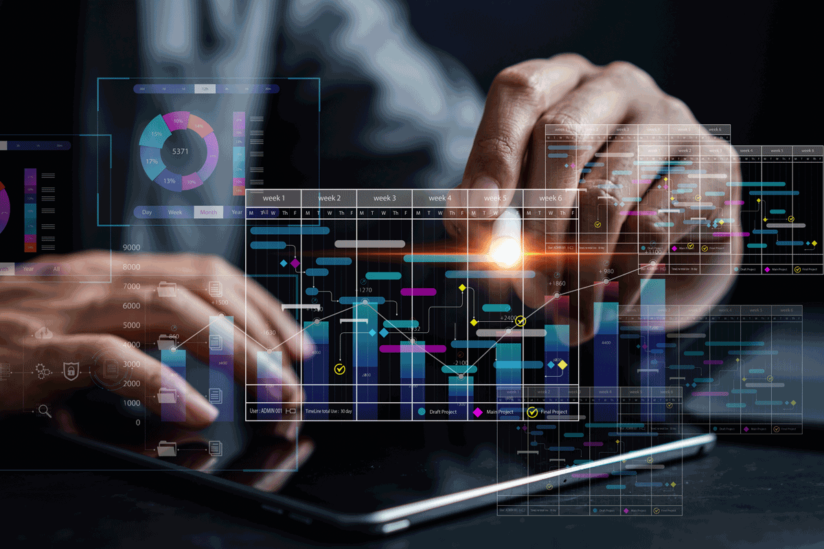 Analyst working with computer in Business Analytics and Data Management System to make report with KPI and metrics connected to database. Corporate strategy